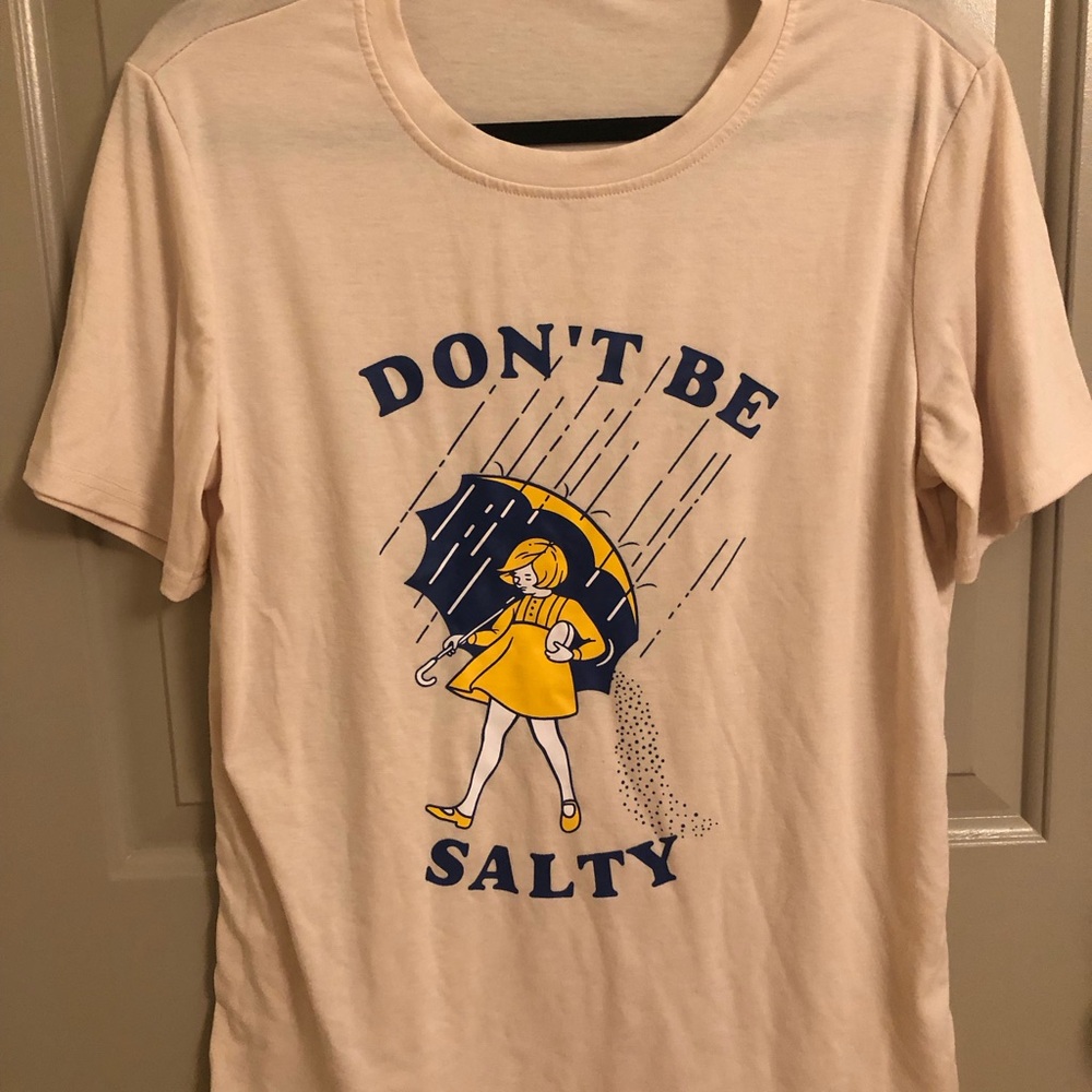 Cream Graphic Tee with Yellow and Blue Design